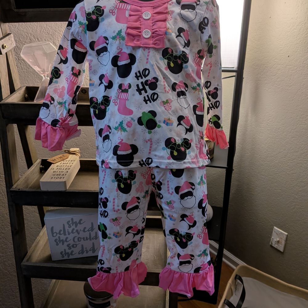 A Classy Chic Boutique Festive Pajama Set with Pink and Black Accents
